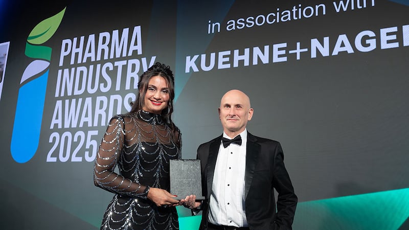 Larissa Coutinho, marketing and communications at SGS Pharma, presents the pharma project of the year - large to Brendan Pyne, Viatris Little Island