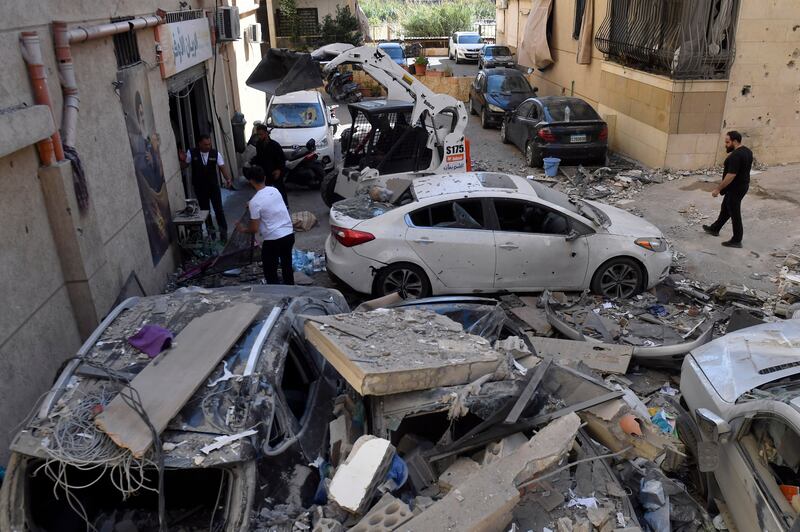 Members of Hizbullah inspect an apartment damaged in an Israeli air strike in Choueifat, south of Beirut, Lebanon, on May 28th, 2026. Photograph: EPA