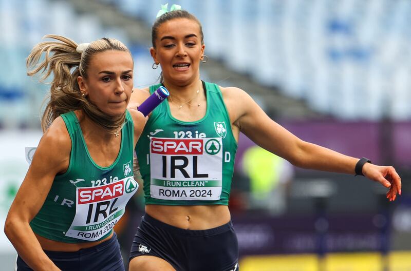 Ireland’s Lauren Cadden passes the baton to Sharlene Mawdsley during this year's European Championships. Photograph: Morgan Treacy/Inpho