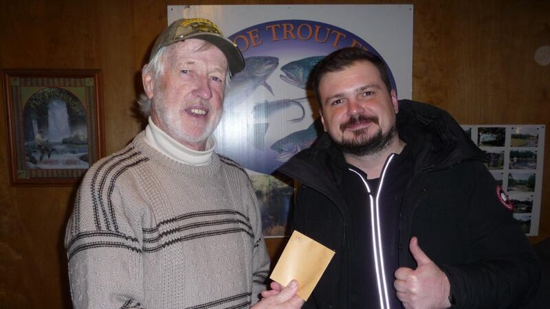 Robert Bujak (right) from Greystones, receiving his Southside Angling Centre voucher from Annamoe Trout Fishery proprietor Brian Nally, following his win in the winter league final