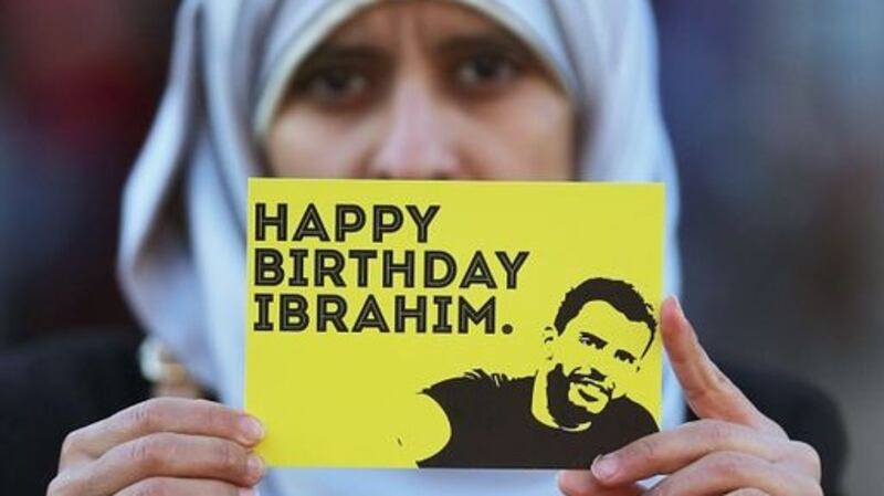 Somaia Halawa, sister of Ibrahim Halawa, holds up a card during a Dublin protest wishing him well at the time of his 21st birthday. He has been incarcerated in Egypt since the age of 17. File photograph: Getty Images