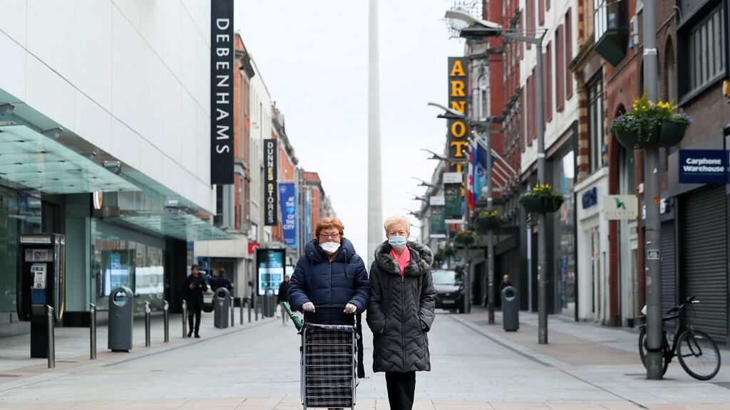 Two women on an almost deserted Henry Street in Dublin city centre. Photograph: Brian Lawless/PA Wire