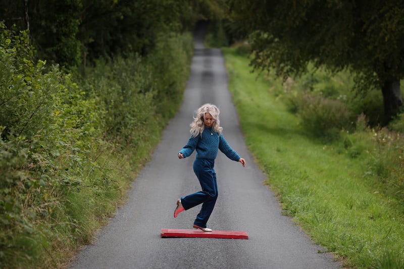 Edwina Guckian demonstrates sean-nós dancing near her home in Drumsna, Co Leitrim. Photograph: Bryan O'Brien