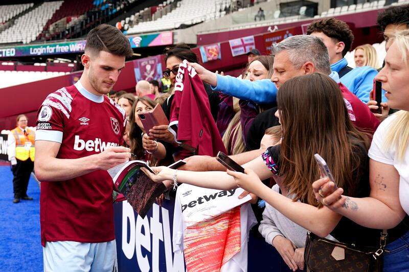 Declan Rice signs autographs for fans. Photograph: John Walton/PA