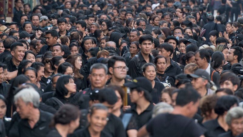 Thai mourners line up to take part in the Royal Cremation ceremony in Bangkok, Thailand, on Wednesday. Photograph: Kittinun Rodsupan/AP