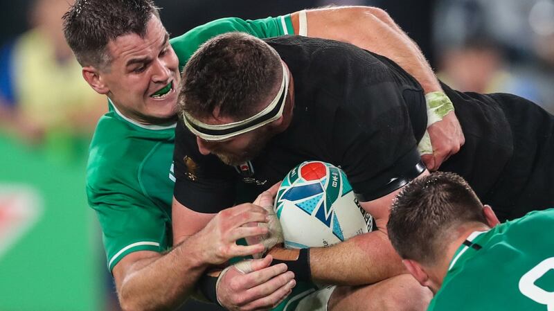 Ireland’s Johnny Sexton tackles New Zealand captain Kieran Read during the Rugby World Cup quarter-final at the Tokyo stadium. Photograph: Billy Stickland/Inpho