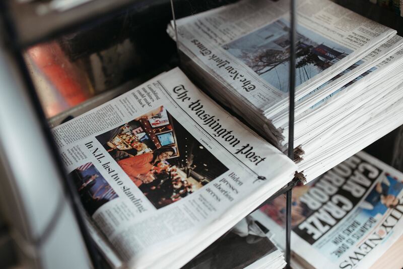 Copies of the Washington Post on a newspaper stand in New York. Photograph: Ahmed Gaber/New York Times
                      