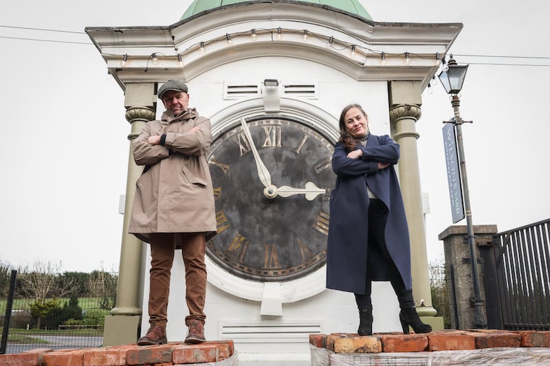 Geoff and Rosy Wilson and a clock tower believed to have originated in Spitafields Market in London for sale at Victor Mee's auction  (€10,000-€20,000) 