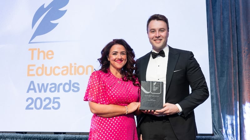 Denise McMorrow, awards judge, presents the best internship programme award to Jack Kneafsey, Bristol Myers Squibb