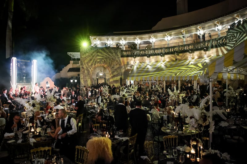 US president Donald Trump talks with guests during a Halloween party at his Mar-a-Lago estate. Photograph:Samuel Corum/Getty Images