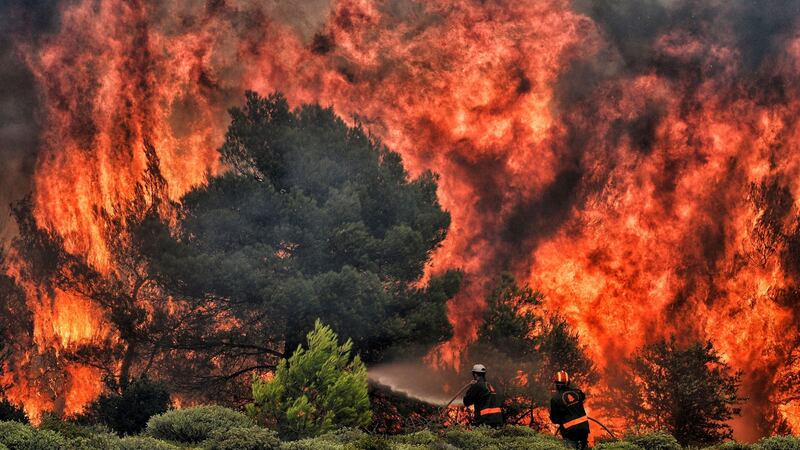 A wildfire blazing within 30km of  Athens on July 24th. Thousands of people have fled their homes, and more than 80 people have died. Photograph: Getty Images