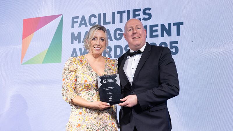 Les Sheridan, managing director at Mitie Facilities Management, presents the FM project of the year - private sector award to Grainne Carberry, FoodSpace