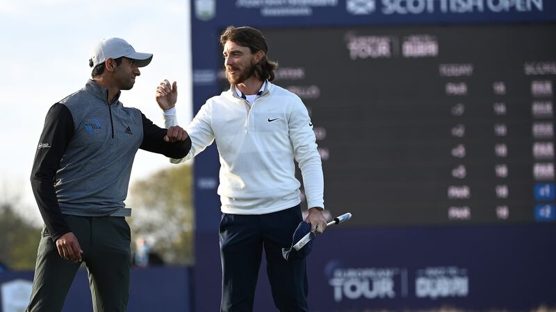 Tommy Fleetwood congratulates Aaron Rai after his playoff win at the Aberdeen Standard Investments Scottish Open at The Renaissance Club  in North Berwick. Photograph: Ross Kinnaird/Getty Images