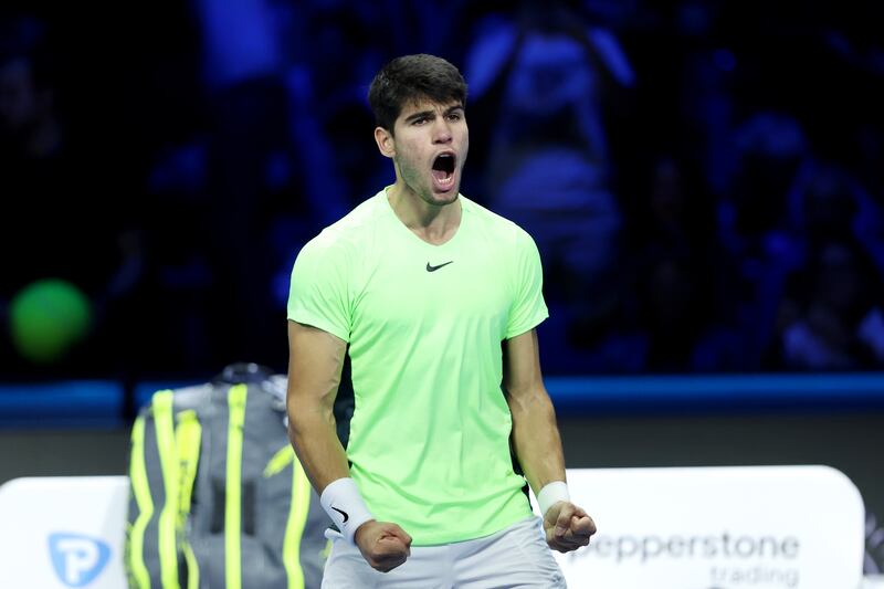 Carlos Alcaraz of Spain celebrates after victory against Daniil Medvedev. Photograph: Clive Brunskill/Getty