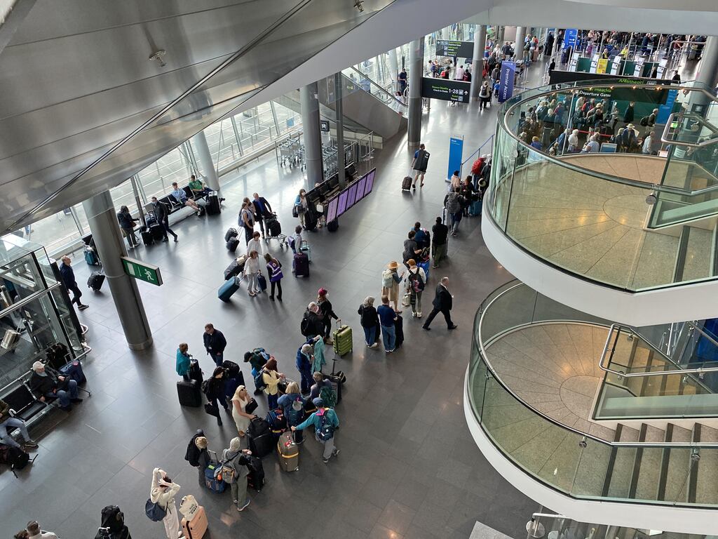 People queuing at Dublin Airport on Thursday. Photograph: Dominic McGrath/PA