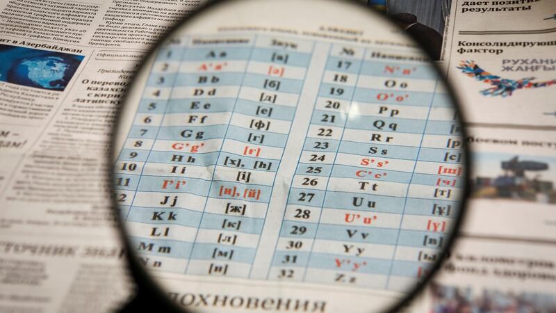 An illustration of  the new Latin-based Kazakh alphabet published in a newspaper  in October. Photograph:  Reuters/Shamil Zhumatov