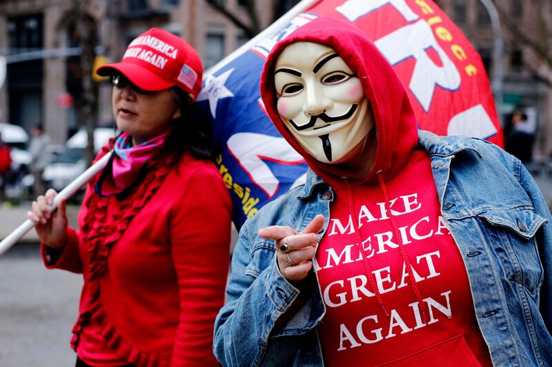 Supporters of former US president Donald Trump protest outside the Manhattan District Attorney's office in New York on Monday. Photograph: Leonardo Munoz/AFP via Getty