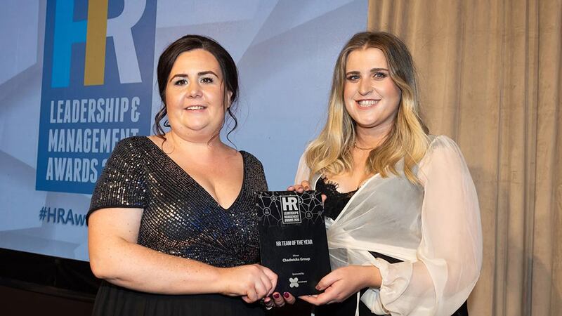 Ciara Connolly, director of commercial recruitment, Excel Recruitment, presents the HR team of the year award to Lisa Barrett, Chadwicks Group