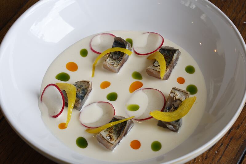 The mackerel is lightly cured and meaty, strands of pickled fennel drape over the small pieces of fish. Photograph: Nick Bradshaw
