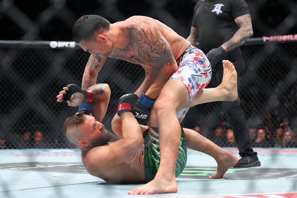 Conor McGregor and Max Holloway in action during their UFC bout in July. Photograph: Ian Maule/Getty Images