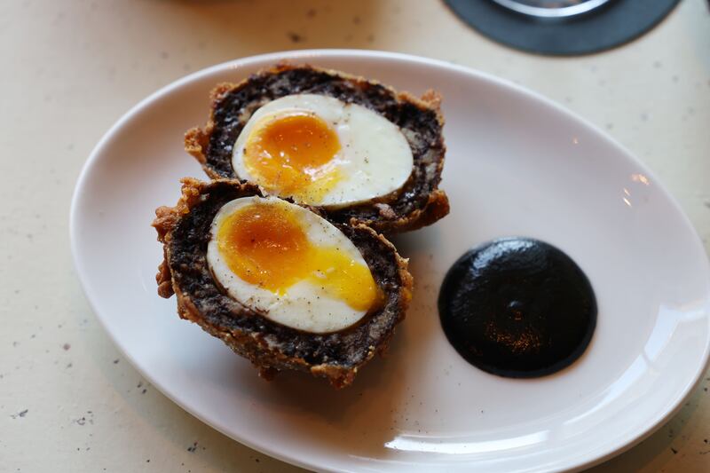 Dirty Auld Scotch Egg wrapped in black pudding at The Libertine. Photograph: Alan Betson