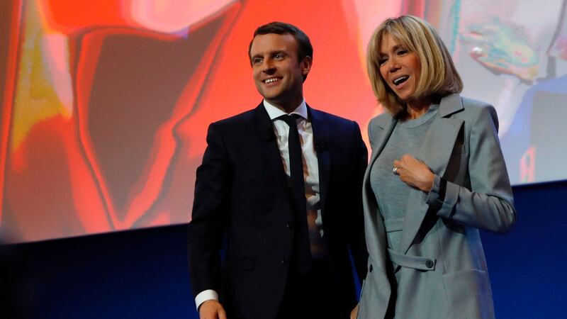 Emmanuel Macron and Brigitte Trogneux  at the Parc des Expositions in Paris,  after the first round of the French presidential election. Photograph: Patrick Kovarik/AFP/Getty Images