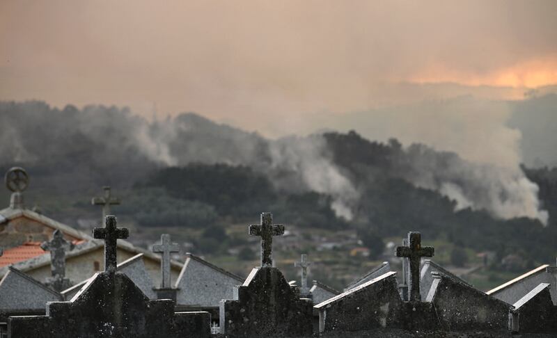 A wildfire burns near the village of Esposende, in northwestern Spain, on Sunday. Photograph: Miguel Riopa/AFP via Getty Images          