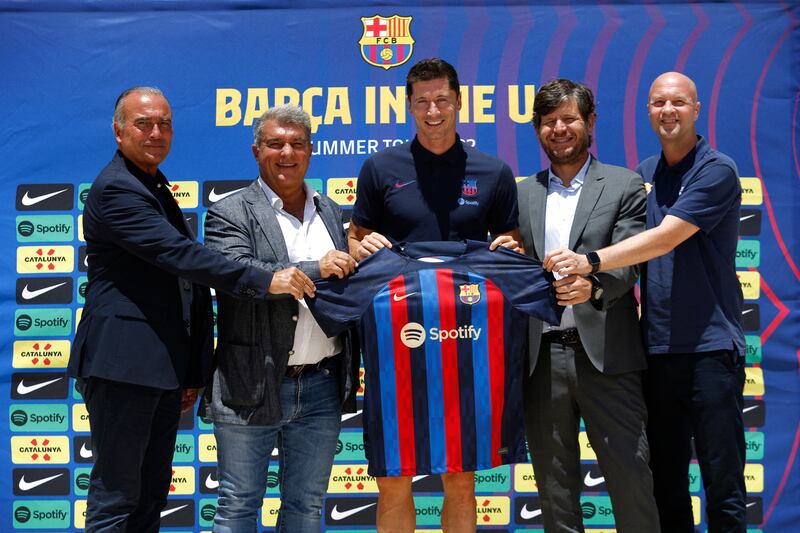 Robert Lewandowski is unveiled as a new Barcelona player by president Joan Laporta after the club said it utilised economic levers to free up funds