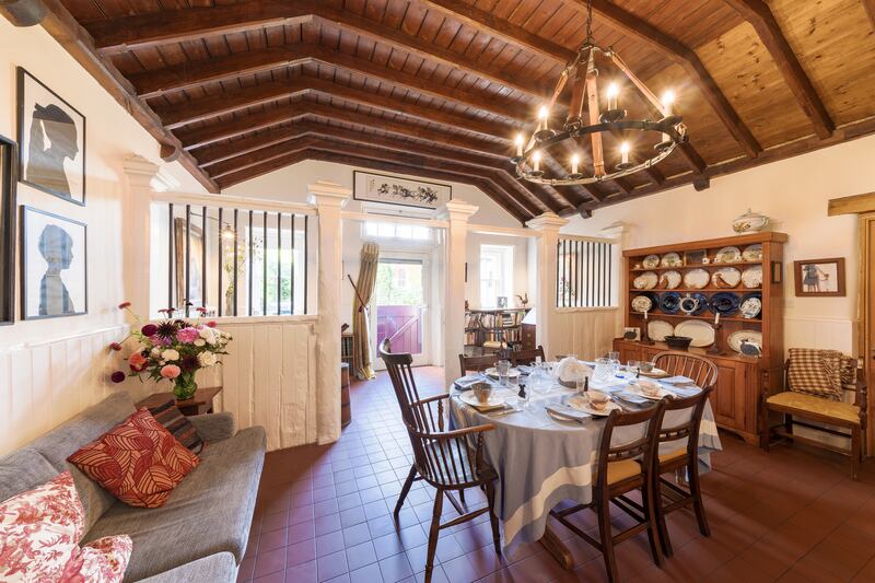 The stained beams of the vaulted ceiling are original