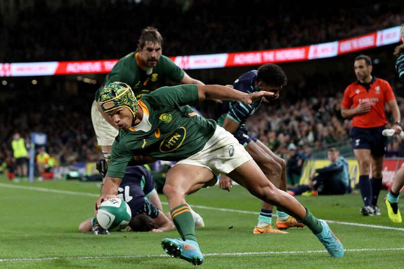 South Africa wing Kurt-Lee Arendse runs in a try late on at the Aviva Stadium. Photograph: Paul Faith/AFP via Getty Images