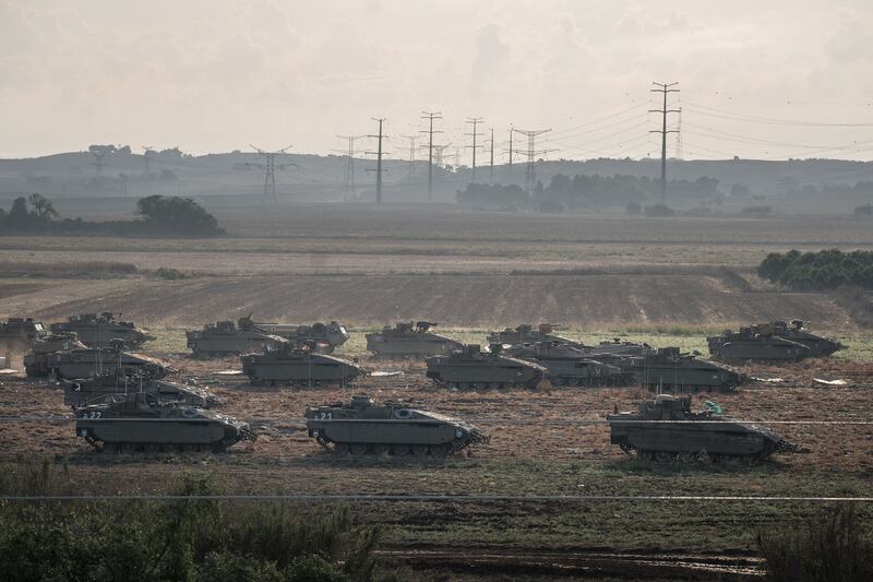 Israeli army tanks, part forces the country has  amassed outside of Gaza in preparation for what is widely expected to be an invasion, near Erez, Israel. Photograph: Sergey Ponomarev/The New York Times
                      