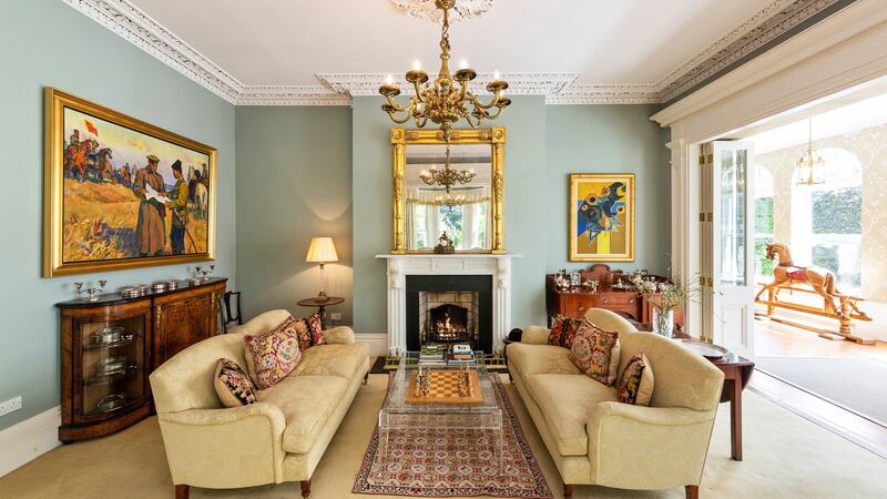 Reception room opening into sunroom