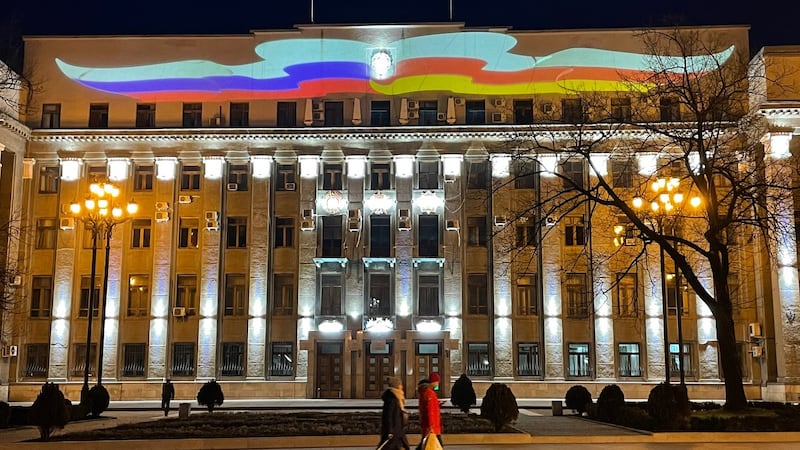 The flags of Russia and North Ossetia projected onto government headquarters in Vladikavkaz, capital of the republic of North Ossetia in southern Russia. Photograph: Daniel McLaughlin