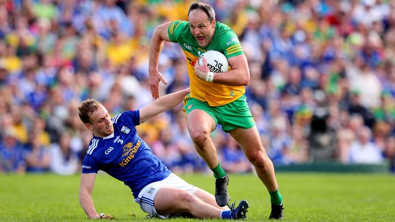 Donegal’s Michael Murphy goes past Cavan’s Pádraig Faulkner during the Ulster SFC semi-final at St Tiernach’s Park in  Clones. Photograph: Ryan Byrne/Inpho