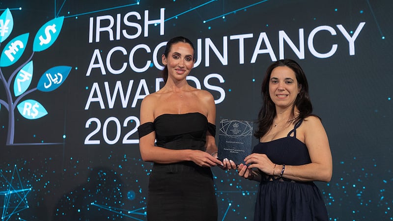Lydia Hall, practice success manager at Sage, presents the accountant of the year award to Talia Bouzon, Noone Casey Financial Services