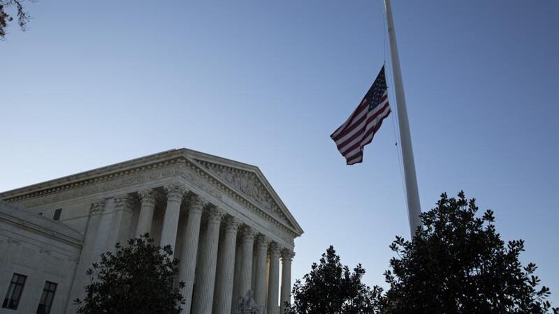 Supreme court flag  at half mast following the death of conservative judge Antonin Scalia, which left a crucial swing seat  in the balance. Photograph: Drew Angerer/Getty Images