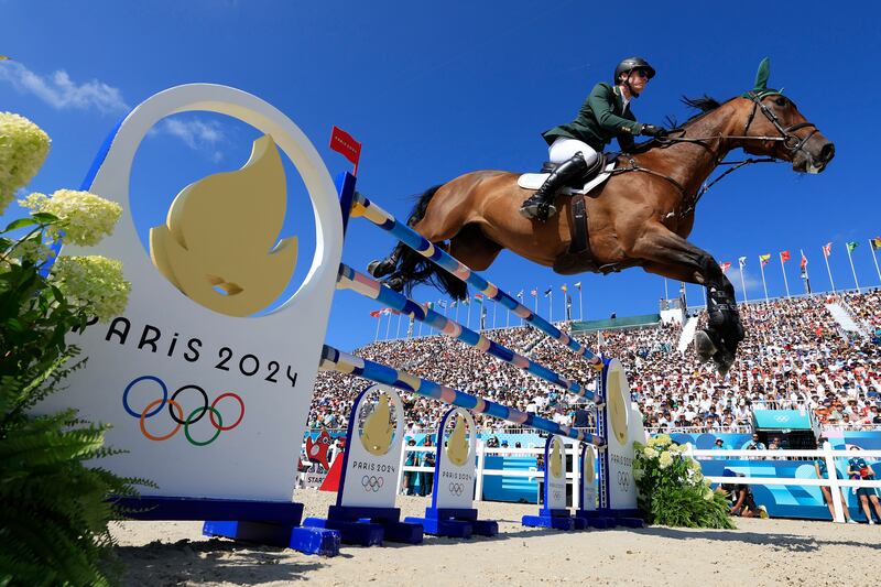 Daniel Coyle and his horse Legacy compete in the Jumping Individual Final at Chateau de Versailles (Photo by Buda Mendes/Getty Images)