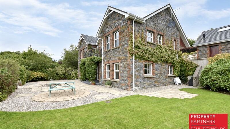 The balcony to the rear of the large four-bedroom house at Cornagill offers views of Lough Swilly.