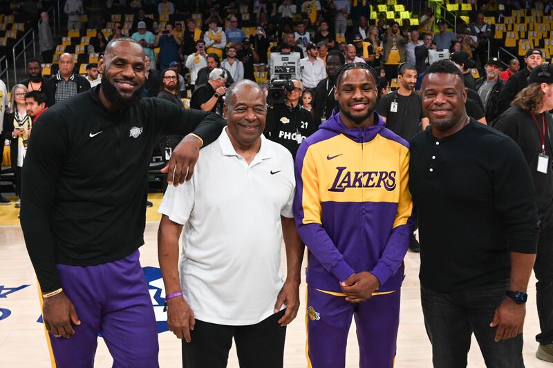 LeBron James, Ken Griffey, Bronny James and Ken Griffey Jr meet ahead of the LA Lakers v Minnesota. Bronny and Lebron James made history as the first father-son duo to play together in an NBA game - the Griffeys achieved the same feat in MLB. (Photograph: David Crane/MediaNews Group/Los Angeles Daily News via Getty Images