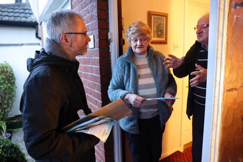 Roderic O'Gorman speaking to Eileen and Peter Fogarty, on a canvass  in The Pines, Castleknock, Dublin, earlier this month. Photograph: Dara Mac Dónaill

