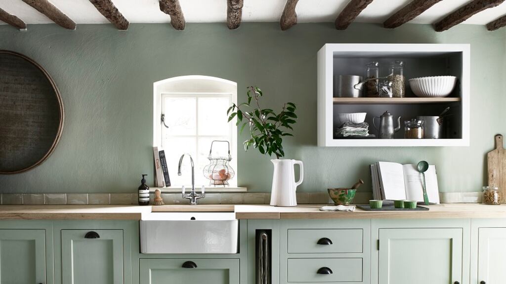 Neptune’s Henley kitchen – seen here in Sage – is the only collection where you can have exposed, natural North American oak or the brand can hand paint the timber