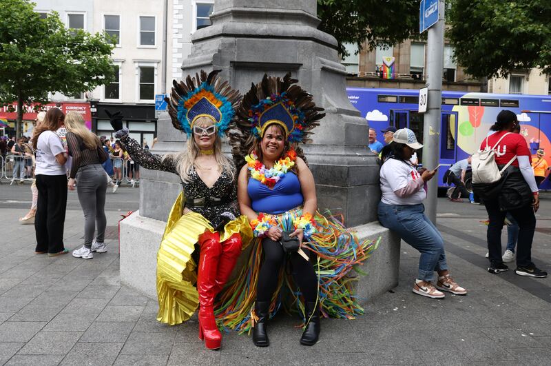 Vanessa Amit (left) and Alexa Flores taking part in the Pride Parade in Dublin City centre. 
Photo: Bryan O’Brien / The Irish Times  
