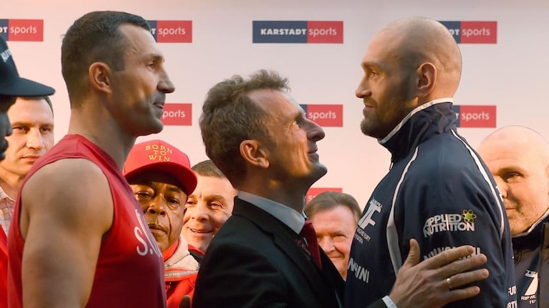 Ukrainian Wladimir Klitschko (left) faces off against Tyson  Fury during an official weigh-in in Essen, Germany on November 27th, 2015, the day before the world heavyweight champion lost his title to Fury. Photograph: Patrik Stollarz/AFP/Getty Images