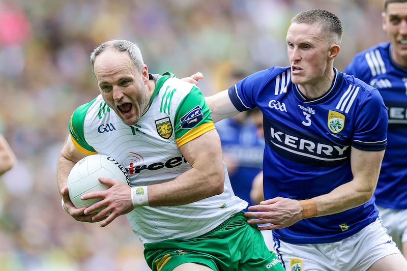 Donegal's Michael Murphy tackled by Jason Foley of Kerry. Photograph: Laszlo Geczo/Inpho