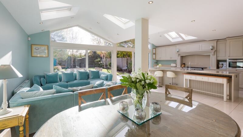 Roomy eat-in kitchen at  121 Stillorgan Heath - a large kitchen/family room, with a double apex roof, a wall of glass overlooks the 8m wide southwest facing garden.