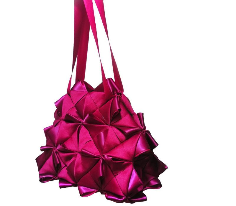 Red silk bag by Helen Hayes from €250, Marvel Room, Brown Thomas