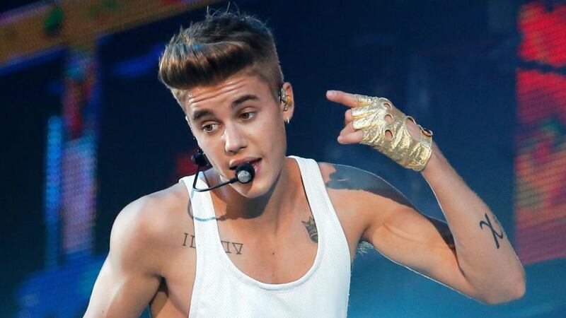 Justin Bieber performing last year at Bercy arena in Paris. Bieber has apologised to those he offended by visiting Japan’s Yasukuni war shrine this week. Photograph: Francois Mori/AP