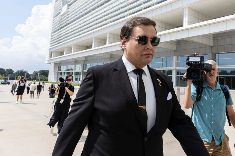 Santos outside the Long Island courthouse. Photograph: Stefan Jeremiah/AP