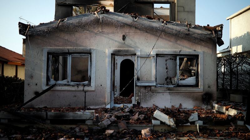 A burnt house following a wildfire at Mati, Greece. Photograph:  Alkis Konstantinidis/Reuters