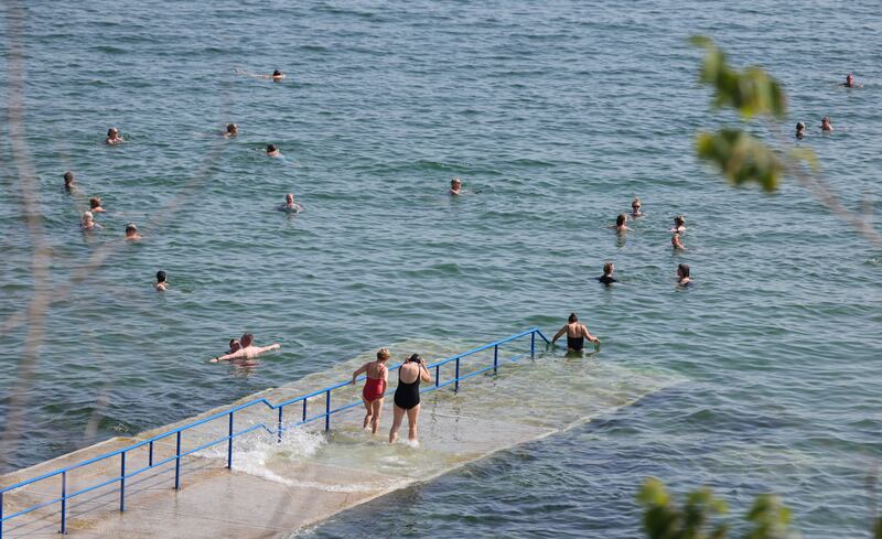 Early morning bathers take to the sea at Seapoint near Blackrock in south county Dublin. Photo: Bryan O’Brien/The Irish Times